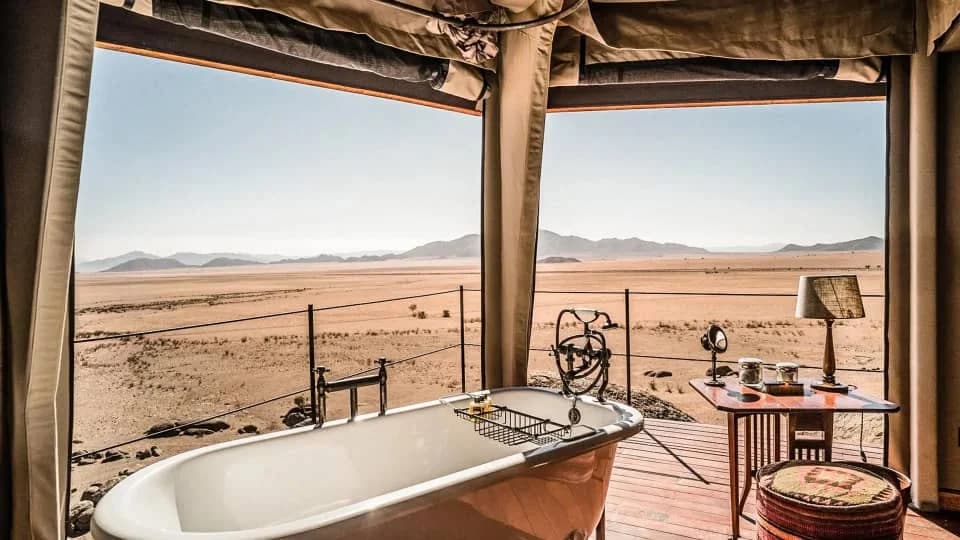Luxury tent bathtub with desert view